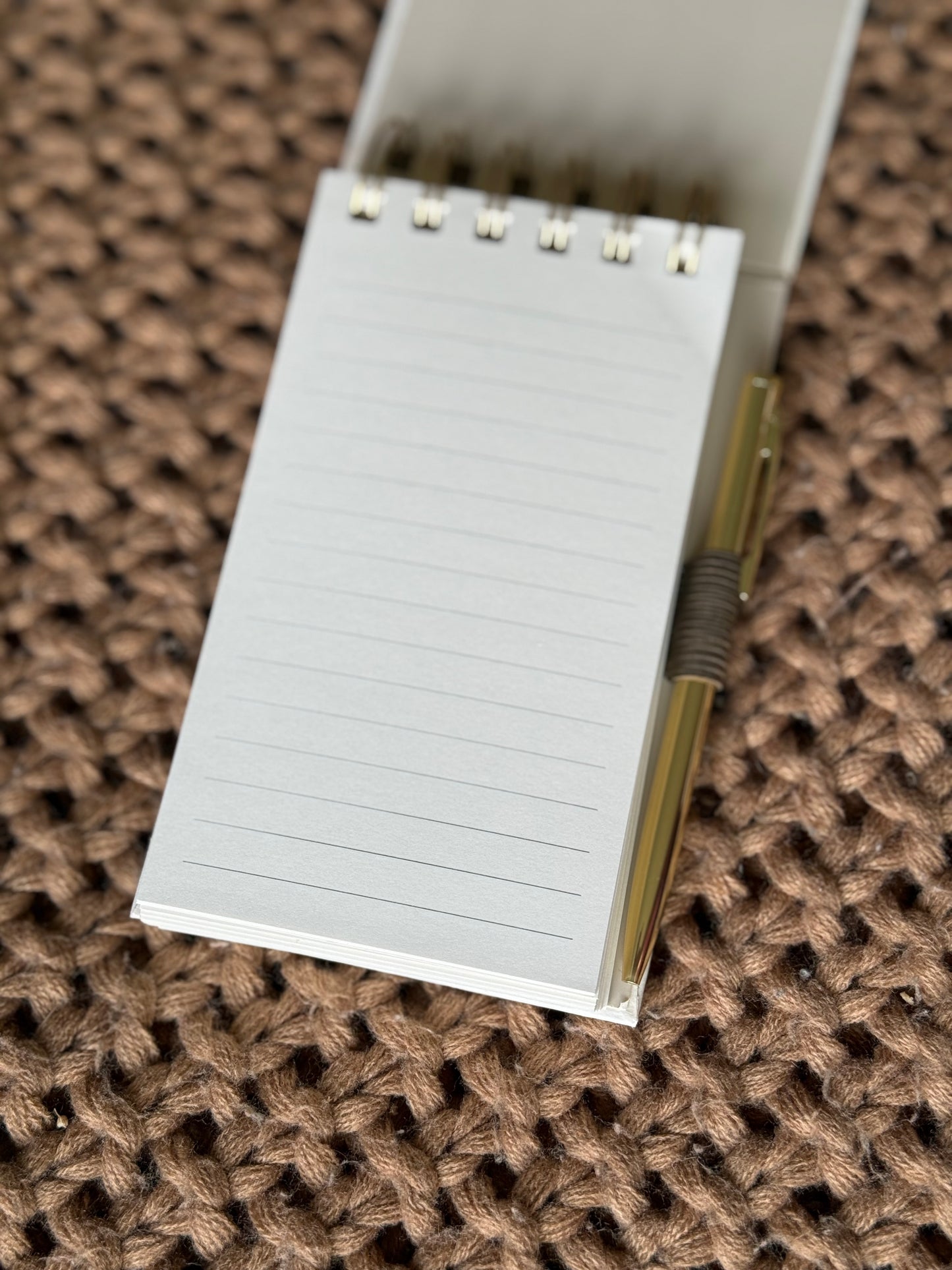 Spiral notepad with pen
