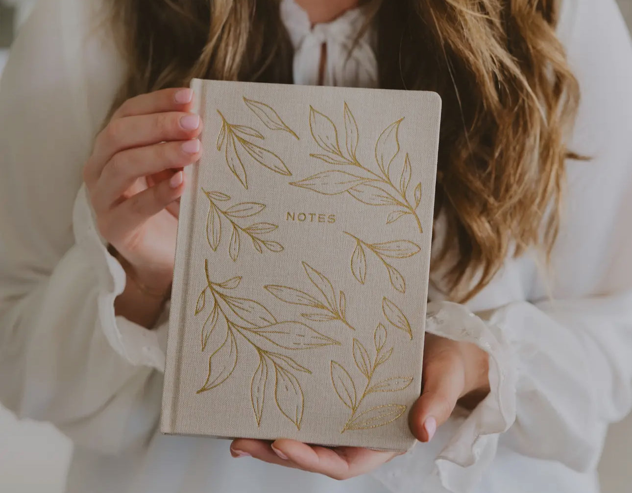 Journal notes with gold leaves