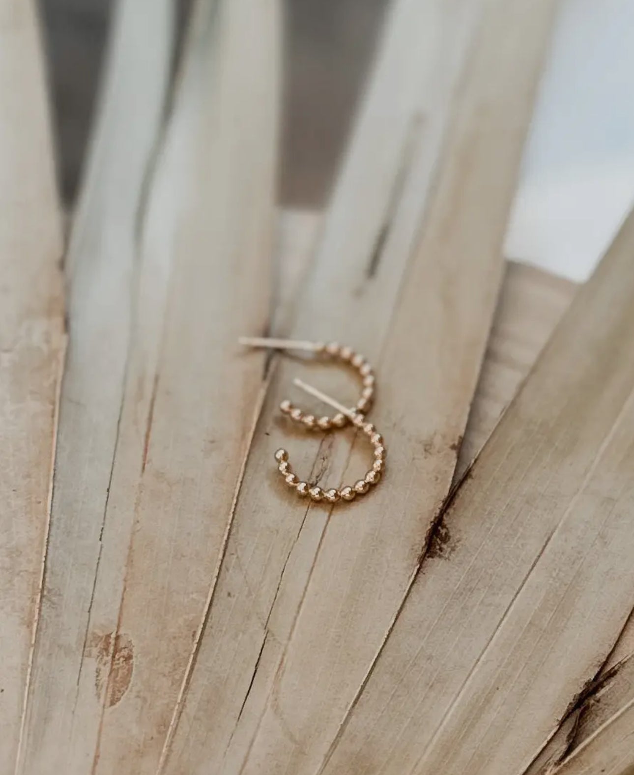 Beaded huggie hoops