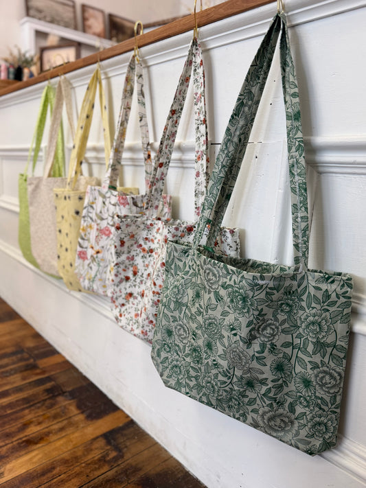 Tote bags, designs by Tay