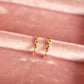 Black polka dot gold hoops