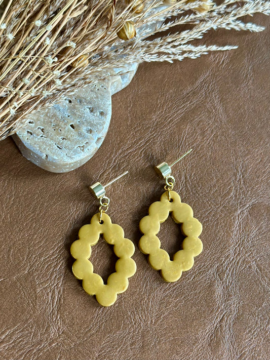 Scalloped diamond cut out dangle