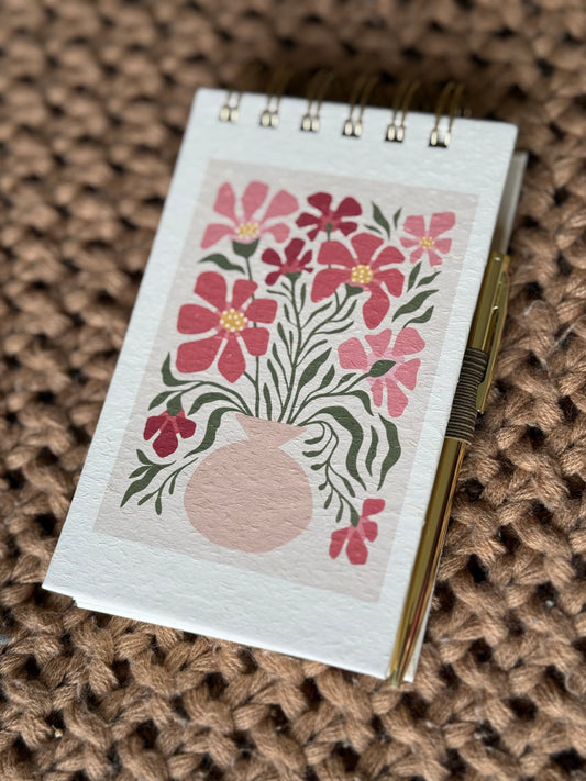 Spiral notepad with pen
