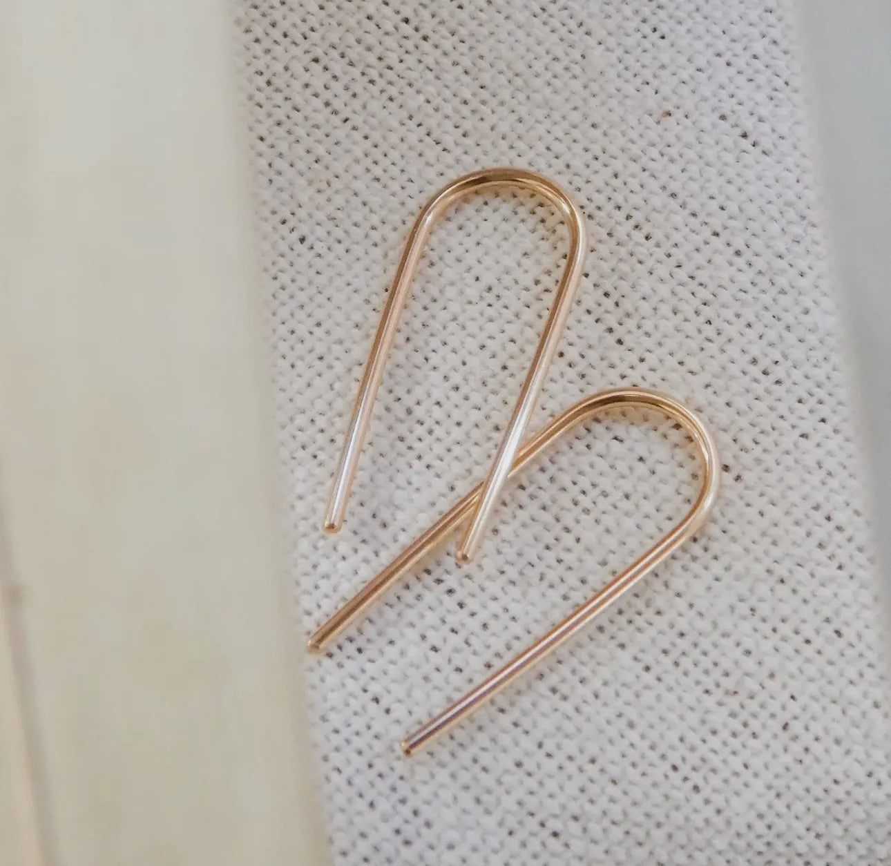 Open arc earrings