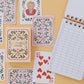 Keeping score notepad and playing card set