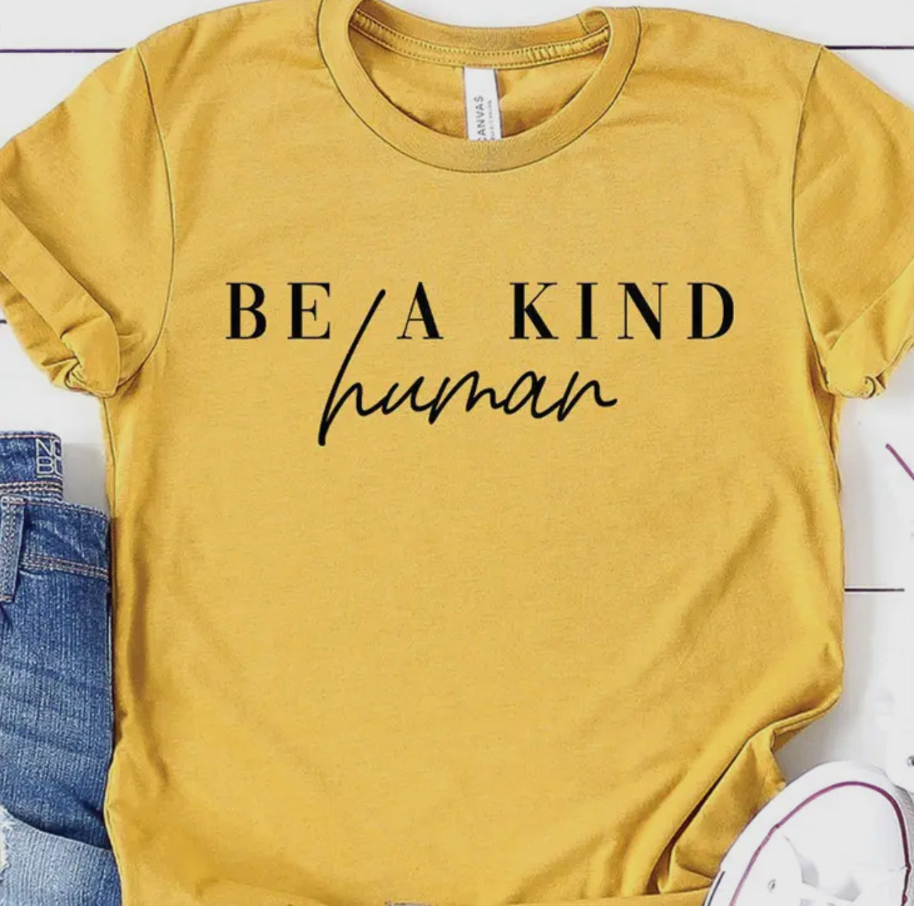 Be a kind human graphic tee