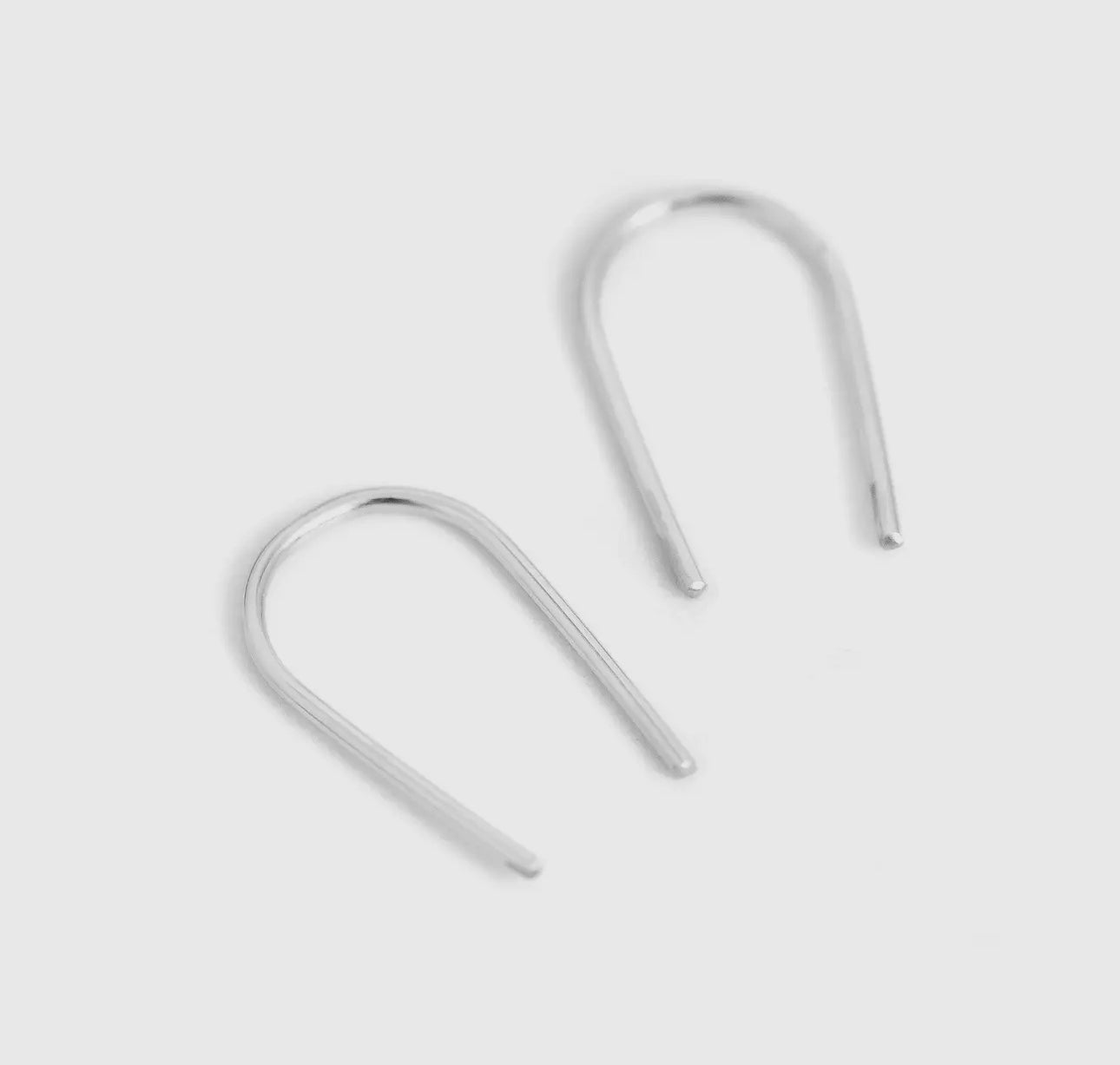 Open arc earrings