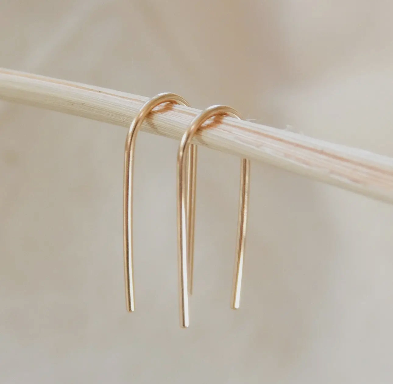 Open arc earrings