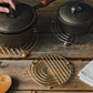 Sunup metal trivet